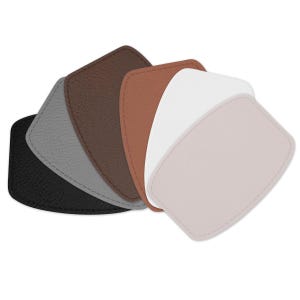 May include: A collection of leather coasters in various colors, including black, gray, brown, tan, white, and pink. Each coaster has a stitched border and a textured surface. The coasters are diamond-shaped with rounded corners.