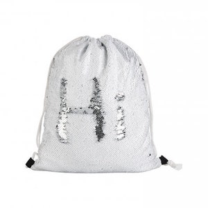 May include: A white drawstring bag with silver sequins that spell out "Hi" on the front.