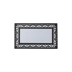 May include: Black rubber doormat with an intricate, ornate design. The mat has a decorative border with a repeating pattern of swirls and loops.