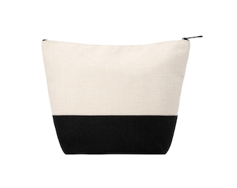 May include: A white and black zippered pouch with a canvas texture. The top half of the pouch is white and the bottom half is black.