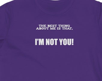 May include: Purple women's t-shirt with white text that reads "The best thing about me is that, I'm not you!"