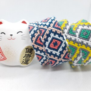paar Braziliaanse armbanden 9 en 18 draden DMC