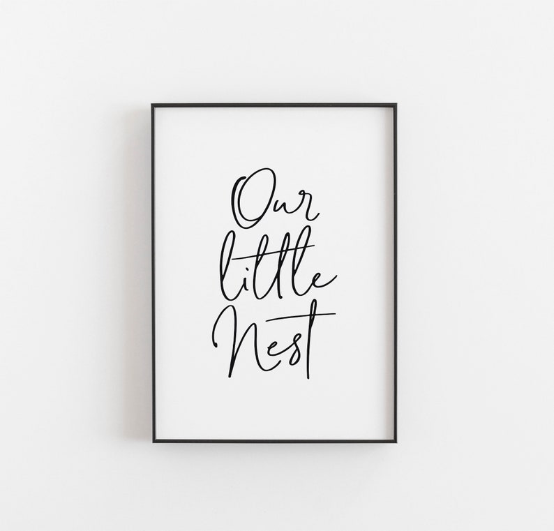 May include: Black and white printable wall art with the text "Our little nest" in a cursive font.