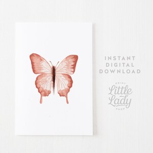 May include: A watercolor painting of a butterfly with brown wings. The butterfly is centered on a white background.