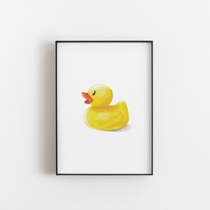 May include: A yellow rubber duck with a red beak and eyes. The duck is sitting on a white background.