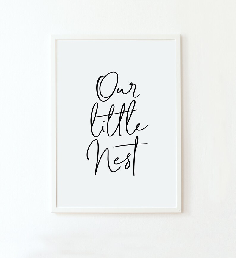 May include: Black and white printable wall art with the text "Our little nest" in a cursive font.