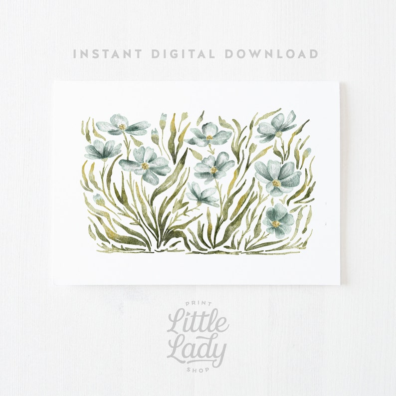 May include: A digital print featuring a watercolor illustration of blue flowers and green leaves. The print has the text "Print Little Lady Shop" at the bottom.