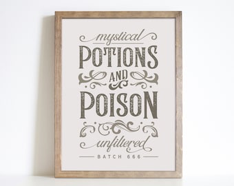 May include: A framed print with a white background and brown text that reads "mystical potions and poison unfiltered batch 666".