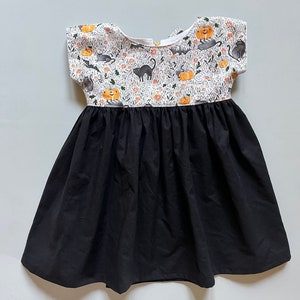 Pattern top and black skirt Georgia Halloween tie-back dress
