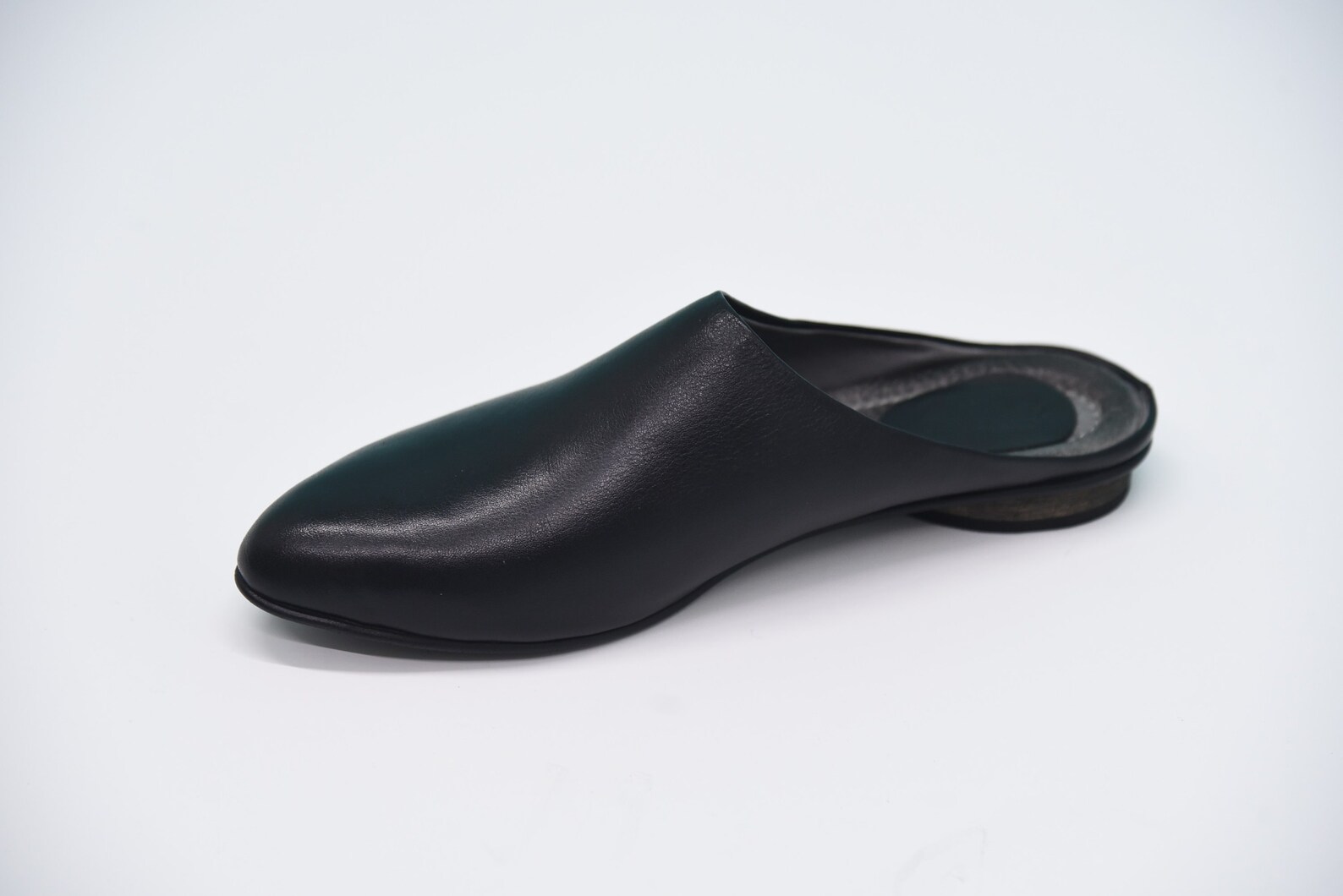 black leather slippers
