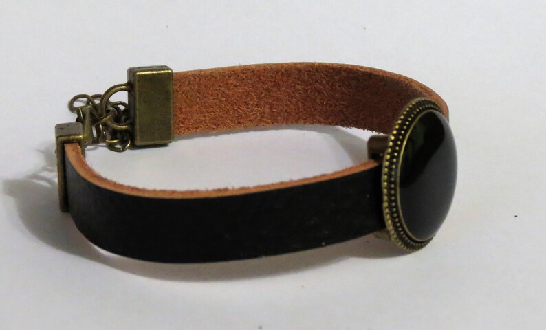 Beautiful leather bracelat with stone made out of coal.