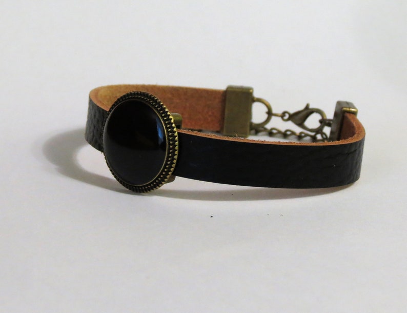 Beautiful leather bracelat with stone made out of coal.