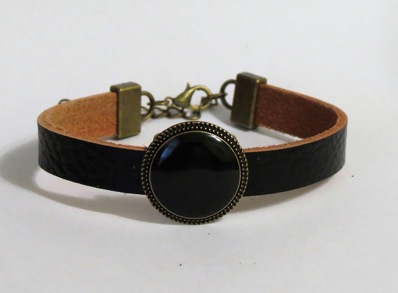 Beautiful leather bracelat with stone made out of coal.