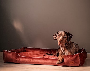 Bed sofa for dogs and cats. Dirty pink soft pet friendly material. Premium bed for dogs with removable covers. Raised edges dog bed