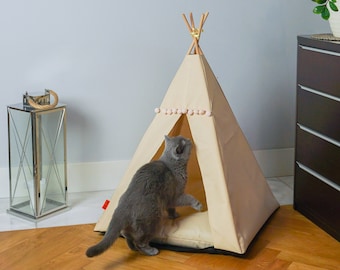 Beige teepee for pets with soft blanket and tent stabilizer. Cat and dog waterproof tent. Dog house with removable cover. Cat cave.