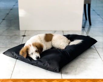 Black, fully waterproof dog pillow. Outdoor dog bed. Dog durable sleeping mat.