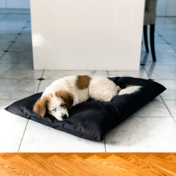 Black, fully waterproof dog pillow. Outdoor dog bed. Dog durable sleeping mat.