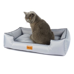 Waterproof Dog Sofa Bed: Easy Clean, Removable Cover