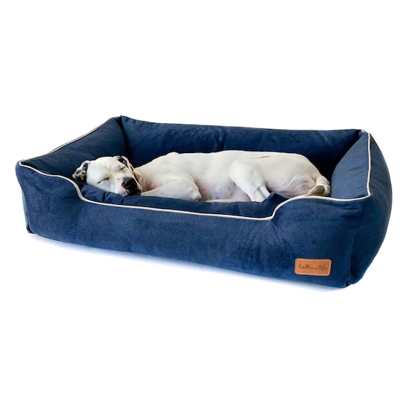 Navy blue sofa for dogs and cats. Soft pet friendly material. Waterproof bed with raised edges for dogs with removable covers. Cat nest.
