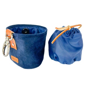 Blue treat bag for dog owners closed with a magnet. Easy to clean training bag with an inner, detachable sac. Strong, pet friendly fabric.