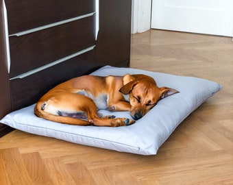 Grey, waterproof pillow for a dog or a cat