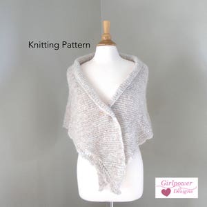 May include: Knitting pattern for a beige shawl with a simple stitch pattern. The shawl is draped over a white mannequin. The text "Knitting Pattern" is visible at the top of the image. The text "Girlpower Designs" is visible at the bottom of the image.