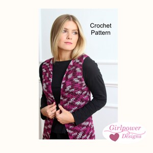 May include: A magenta, white, and gray crochet vest with a geometric pattern. The vest is open in the front and worn over a black long-sleeve shirt. The image includes the text "Crochet Pattern" and the logo "Girlpower Designs".