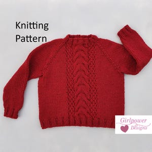 Puede incluir: Un suéter rojo tejido con un diseño de punto trenzado en el centro. Las palabras "Knitting Pattern" están en la parte superior izquierda. El logotipo de Girlpower Designs está en la esquina inferior derecha.