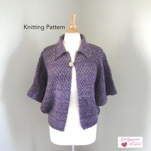 May include: A purple knitted jacket with a collar and short sleeves, displayed on a mannequin. The jacket is fastened with a single button. The words "Knitting Pattern" are visible in the image.