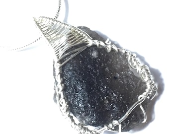 Colgante de tectita, meteorito y plata