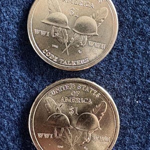 May include: A set of three ceramic mugs with a speckled, matte finish. The mugs are in shades of cream, light gray, and dark gray. Each mug has a simple, minimalist design, perfect for coffee or tea.