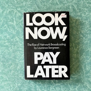 May include: A black book with the title "Look Now, Pay Later" and the subtitle "The Rise of Network Broadcasting by Laurence Bergreen".