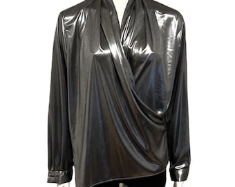May include: A silver metallic long-sleeved blouse with a wrap-style neckline.
