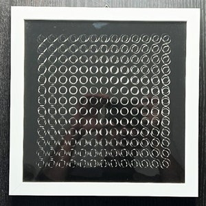 Victor Vasarely - Two overlapping spaced screen prints, one on cardboard, the other on transparent film create the kinetic effect.