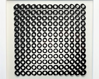 Victor Vasarely - Two overlapping spaced screen prints, one on cardboard, the other on transparent film create the kinetic effect.