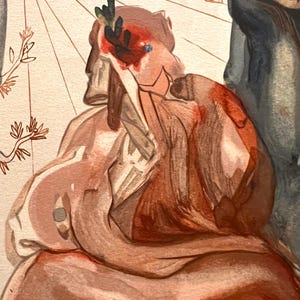 May include: A white ceramic mug with a black handle and the text "But First, Coffee" in a black, handwritten-style font. The mug is on a white surface.