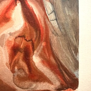 May include: Close-up of a watercolor painting with a blend of red, brown, and gray hues. The artwork features abstract shapes and textures, with visible brushstrokes and color variations. The painting is on white paper.
