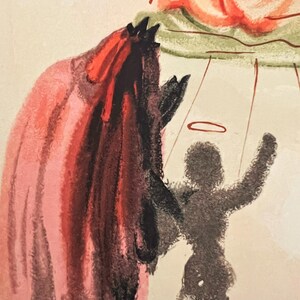 May include: An artistic illustration featuring a figure in a red cloak with a black, horned head. A shadowy figure with a halo raises its arms. The artwork has a surreal, dreamlike quality, with muted colors and a sense of mystery.