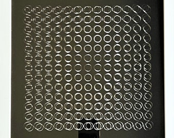 Victor Vasarely - Two overlapping spaced screen prints, one on cardboard, the other on transparent film create the kinetic effect.
