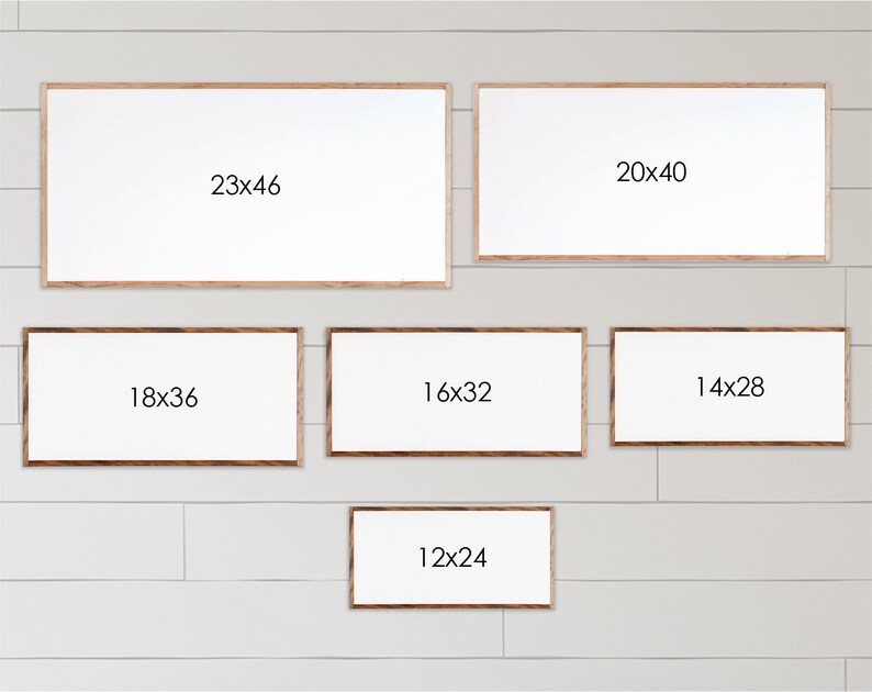 May include: A wall with six different sized wood frames, each with a white background and the dimensions of the frame written in black text. The frames are arranged in a staggered pattern, with the largest frame at the top and the smallest frame at the bottom.
