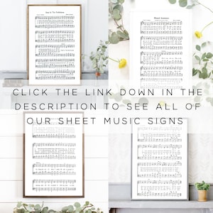 May include: Four framed sheet music prints with varying frame styles. The text "CLICK THE LINK DOWN IN THE DESCRIPTION TO SEE ALL OF OUR SHEET MUSIC SIGNS" is visible. The prints feature musical notation and lyrics.