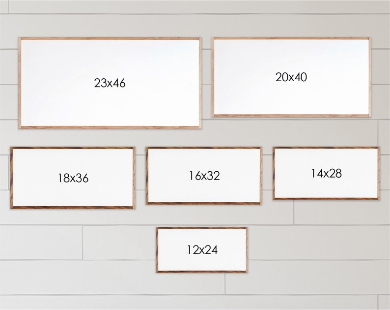 Może przedstawiać: Wystawa sześciu drewnianych ramek do zdjęć o r&oacute;żnych rozmiarach z białymi passe-partout. Ramki są ułożone w spos&oacute;b schodkowy. Ramki są oznaczone wymiarami w calach: 23x46, 20x40, 18x36, 16x32, 14x28 i 12x24.