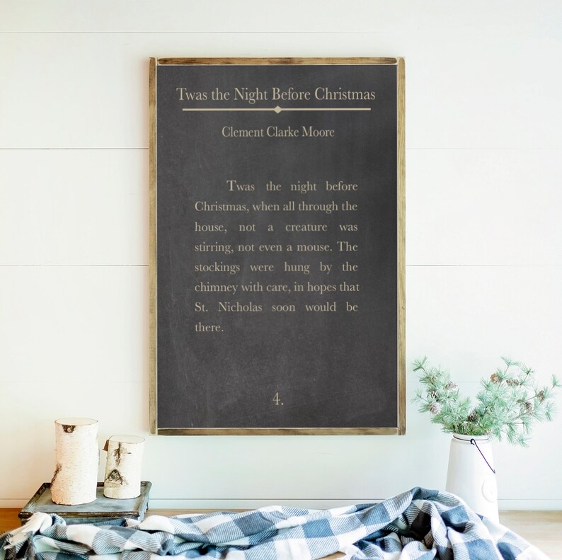 Puede incluir: Un letrero de pizarra negra con marco de madera, que presenta el texto "Twas the Night Before Christmas" de Clement Clarke Moore. El texto est&aacute; en blanco sobre fondo negro.