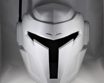 May include: White plastic helmet with a black visor and a small antenna on top.
