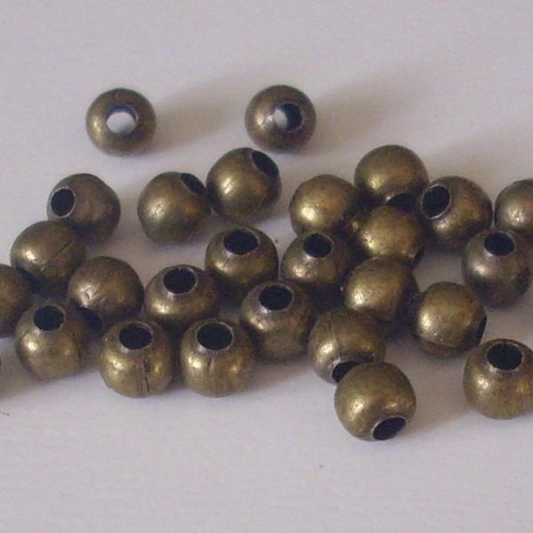 100 Perles en métal intercalaire bronze 4 mm - bead spacer