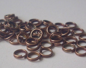 1000 Dubbele ringen 5 mm koperkleur -