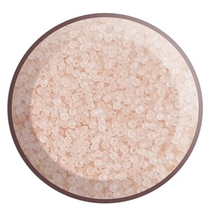 May include: A close-up view of a bowl filled with small, translucent, light pink beads. The beads are round and have a slightly frosted finish.
