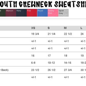 May include: Size chart for youth crewneck sweatshirts in sizes XS, S, M, L, and XL. The chart shows measurements for body length, body length tolerance, chest tolerance, chest width, numerical sizes, sleeve length, and sleeve tolerance. Measurements are in inches.