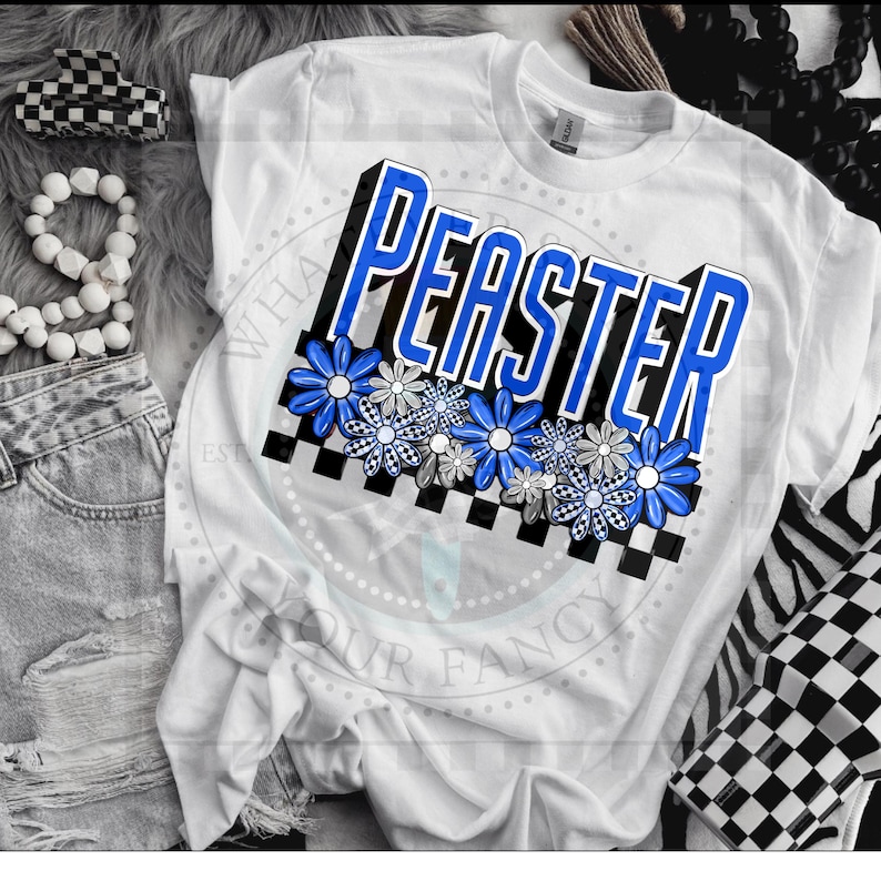 May include: White t-shirt with a blue and black graphic that says "PEASTER" with checkered squares and blue flowers.
