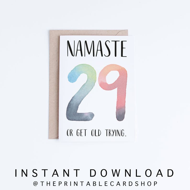 May include: A greeting card with a watercolour rainbow design of the number 29. The card says "Namaste 29 or get old trying."